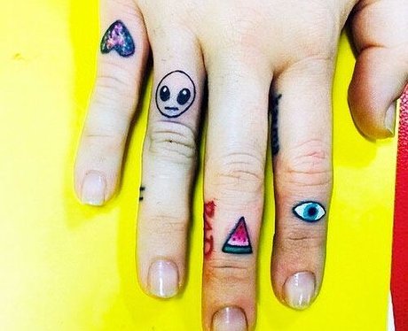 Miley Cyrus' hand tattoos are unique and interesting. - 23 Amazing