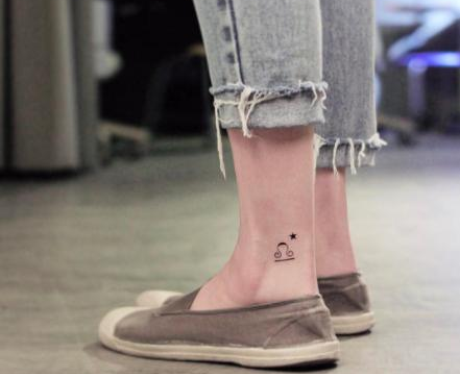 Libra star sign tattoo 
